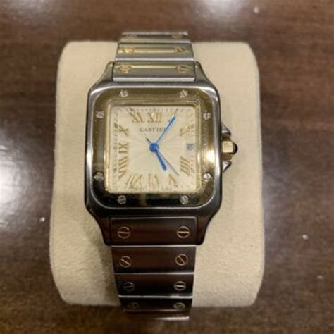 santos de cartier quartz swiss made or et acier|cartier santos quartz price.